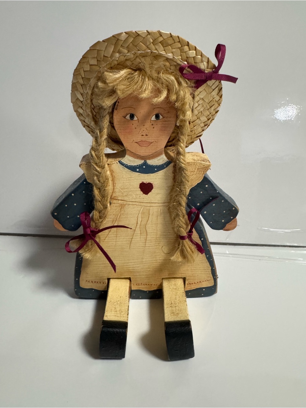 Hand-Painted Wooden Girl Doll in Navy Dress with Straw Hat 9” (laid flat)